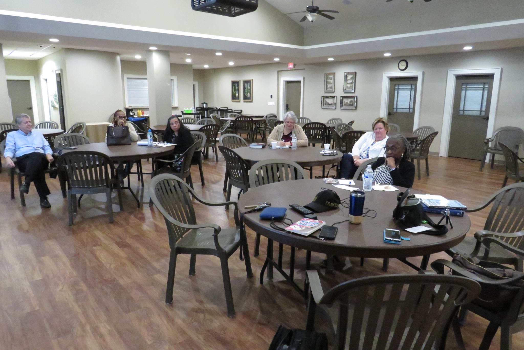 Participants sitting at tables