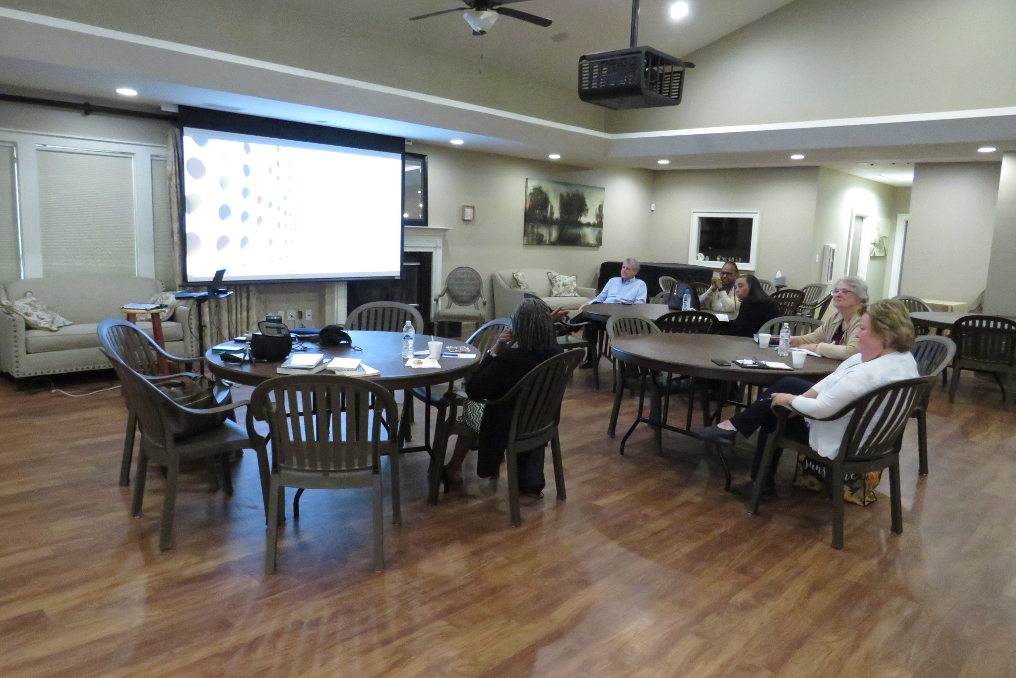 Participants sitting at tables